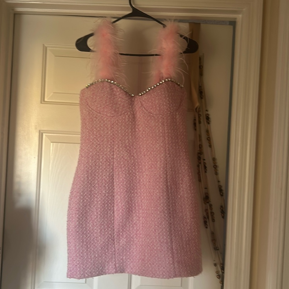 Tweed mini Dress Fashion Nova
Feather Detail on shoulder 
100% Polyester